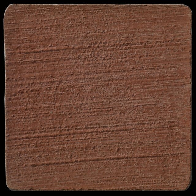 This is a photo of an actual 3” x 3” concrete tile sample integrally colored with Davis Colors’ Brick Red (pigment # 160) with a broom finish.  This video reproduction is just for ideas. Please finalize your color selection from our printed color card, hard tile samples or job site test.