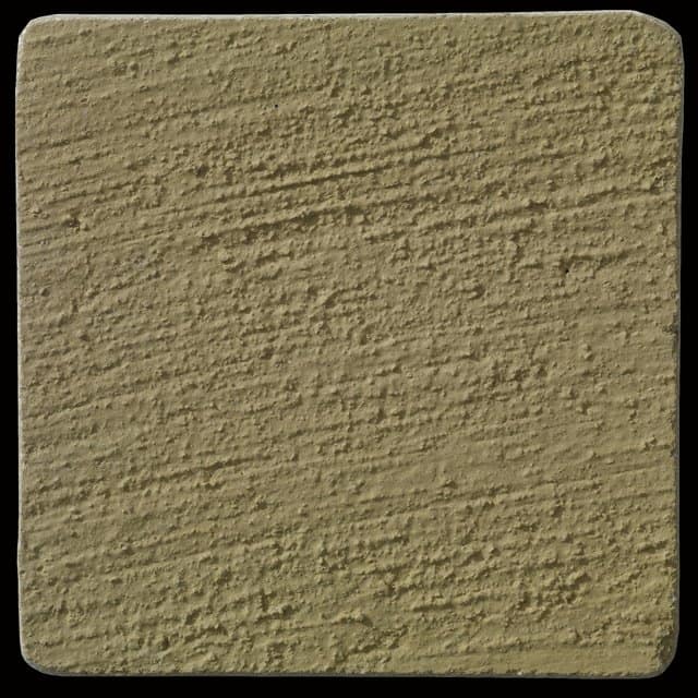 This is a photo of an actual 3” x 3” concrete tile sample integrally colored with Davis Colors’ Mesa Buff (pigment # 5447) with a broom finish.  This video reproduction is just for ideas. Please finalize your color selection from our printed color card, hard tile samples or job site test.