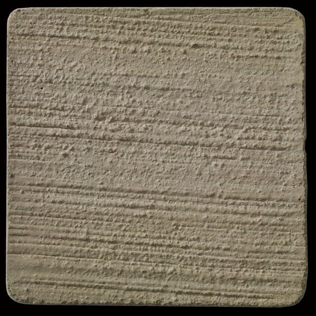 This is a photo of an actual 3” x 3” concrete tile sample integrally colored with Davis Colors’ San Diego Buff (pigment # 5237) with a broom finish.  This video reproduction is just for ideas. Please finalize your color selection from our printed color card, hard tile samples or job site test.