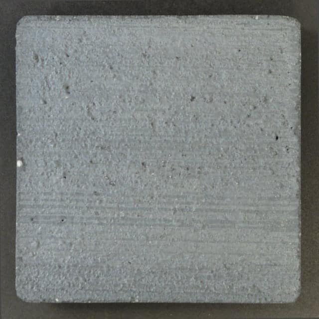This is a photo of an actual 3” x 3” concrete tile sample integrally colored with Davis Colors’ Dark Gray Carbon (pigment # 8084) with a broomed finish. This video reproduction is just for ideas. Please finalize your color selection from our printed color card, hard tile samples or job site test.
