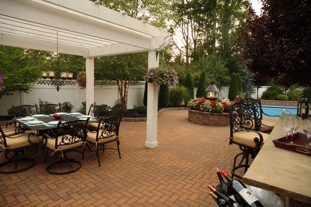 This patio is paved with Nicolocks Holland pavers and colored with their Golden Brown blend.  Nicolock uses Davis Colors concrete pigments to make their custom color blends.  To learn more about Nicolocks products visit them at www.nicolock.com.