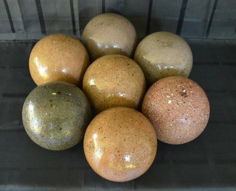 Davis Colors, exposed concrete and sealed 8” spheres (made with concrete mix) ‐ Spanish Gold, Dark Gray, Tile Red, Harvest Gold, San Diego Buff, Taupe and Kailua. These spheres were made by Dave Reierson of Fort Lauderdale, FL. Reierson@att.net - Phone: 954-232-3469