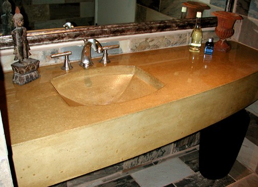 Precast colored concrete bathroom sink and countertop was made by Flying Turtle Cast Concrete (www.flyingturtlecastconcrete.com). Concrete colored with custom colors using Davis Colors’ quality concrete pigments (www.daviscolors.com).