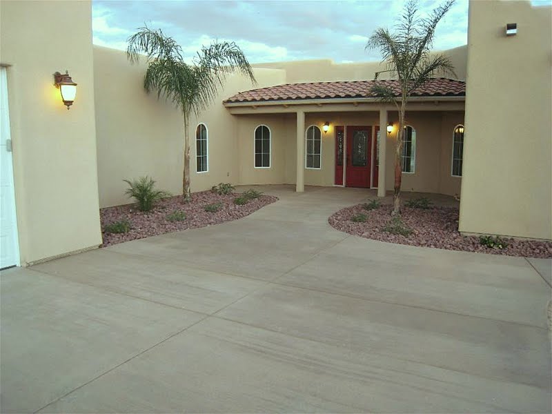 This integally colored concrete driveway at a home in Big River, CA was colored with Davis Colors' Omaha Tan.  This photo was taken by Gene Anderson.