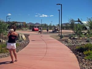 This concrete walkway at the Heritage Bark Park in Henderson, NV was colored with Davis Colors’ Baja Red and finished with a broom finish. The landscape design was done by the Design Workshop. To contact the Design Workshop visit their website www.designworkshop.com or call them at 775-588-5929. To learn more about this project go to http://www.landscapeonline.com/research/article/14721.