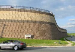 This enormous keystone retaining wall in Abingdon Maryland was built by Griffith Brothers Inc. (410-683-8885) with Keystone Standard units manufactured York Building Products (www.yorkbuilding.com). The colors used were buff, light brown and dark brown.