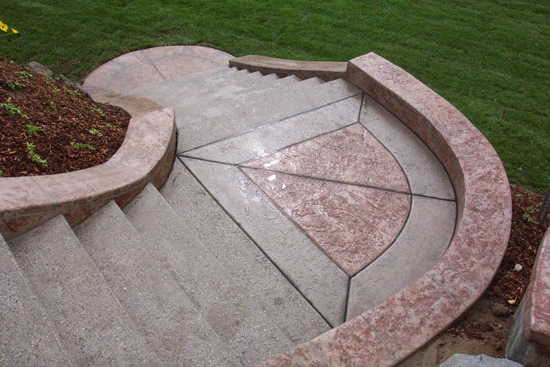 This staircase was colored with Davis Colors’ Outback and given a light sand blast finish. The stamped concrete was colored with Davis Colors’ Outback and highlighted with a terra cotta colored release agent.
