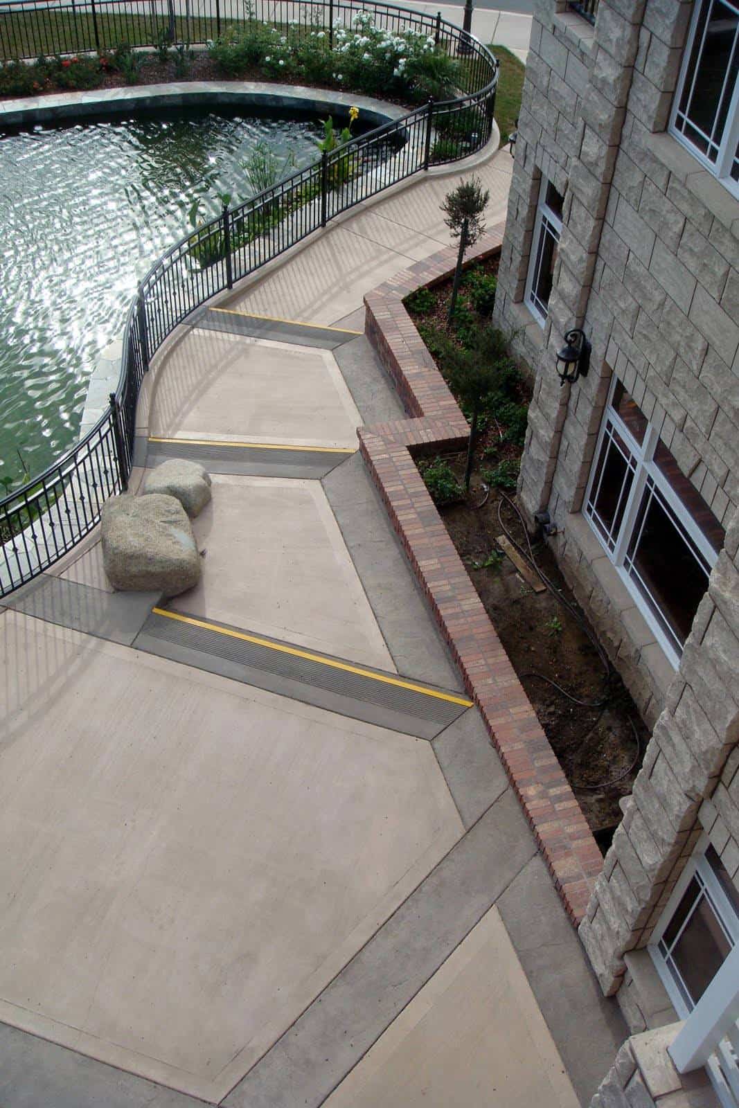This walkway was integrally colored with Davis Colors' Padre Brown with a Walnut colored release agent and Davis Colors' Meadowbrook Brown (custom color).