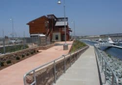 This is a photo of Pier 32 Marina located in National City near San Diego, CA.  The upper concrete sidewalk was colored with Davis Colors Spanish Gold (www.daviscolors.com).  The concrete work was done by Mar Vista Construction (www.marvistaconstruction.com).  The concrete was supplied by Superior Ready Mix (www.superiorrm.com, sales@superiorrm.com).