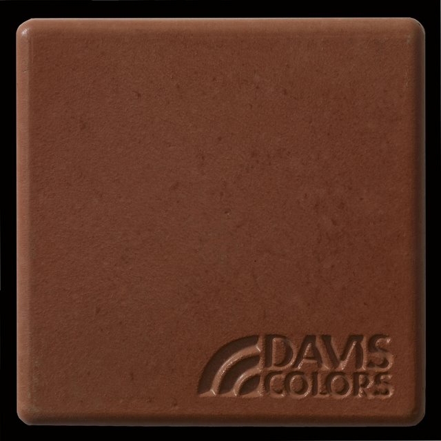 Sample tile colored with Davis Colors Brick Red concrete pigment