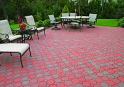 This patio is paved with Nicolocks Cobblestone pavers with their Fire Island color blend. Nicolock uses Davis Colors concrete pigments to make their custom color blends. To learn more about Nicolocks products visit them at www.nicolock.com.