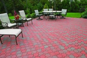 This patio is paved with Nicolocks Cobblestone pavers with their Fire Island color blend. Nicolock uses Davis Colors concrete pigments to make their custom color blends. To learn more about Nicolocks products visit them at www.nicolock.com.