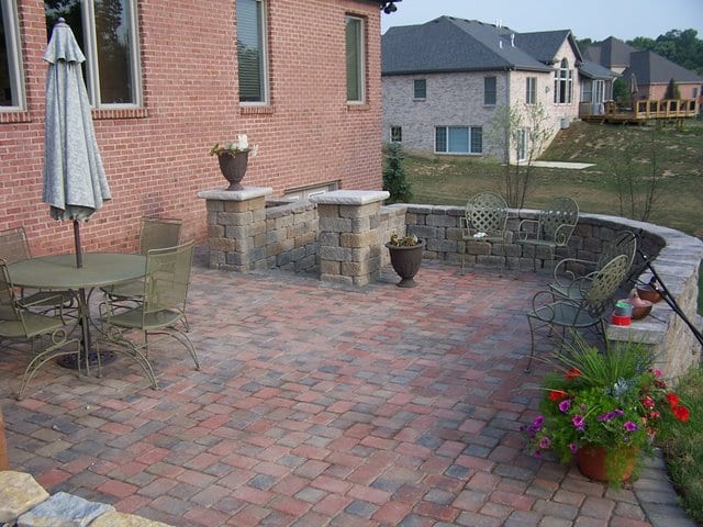 Concrete Block: Wilson Concrete products Country Manor with a Cedar color blend.  The concrete pavers are Wilson Concrete Products Cobblesone Pavers with their custom New England color blend.
