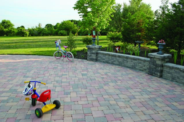 This patio is paved with Nicolock’s Country pavers with their Bayberry color blend.  Nicolock uses Davis Colors concrete pigments to make their custom color blends.  To learn more about Nicolock’s products visit them at www.nicolock.com.