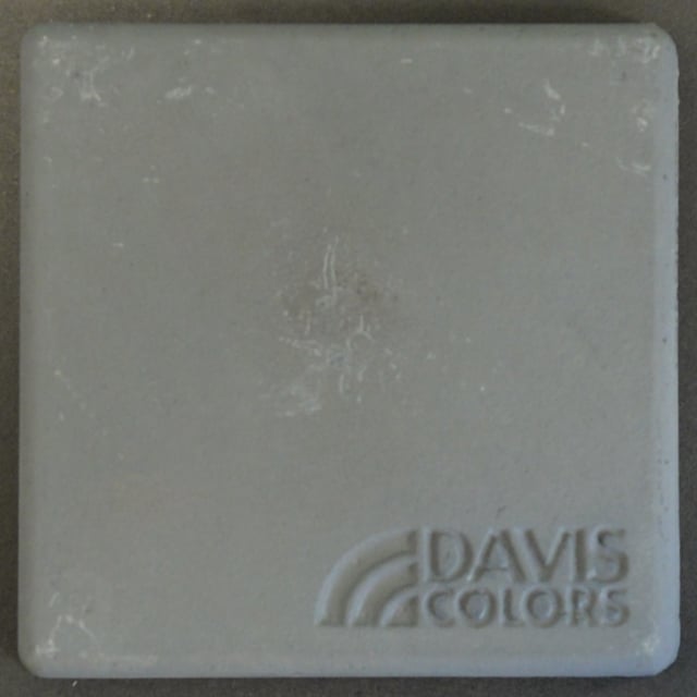 Sample tile colored with Davis Colors Dark Gray Carbon concrete pigment