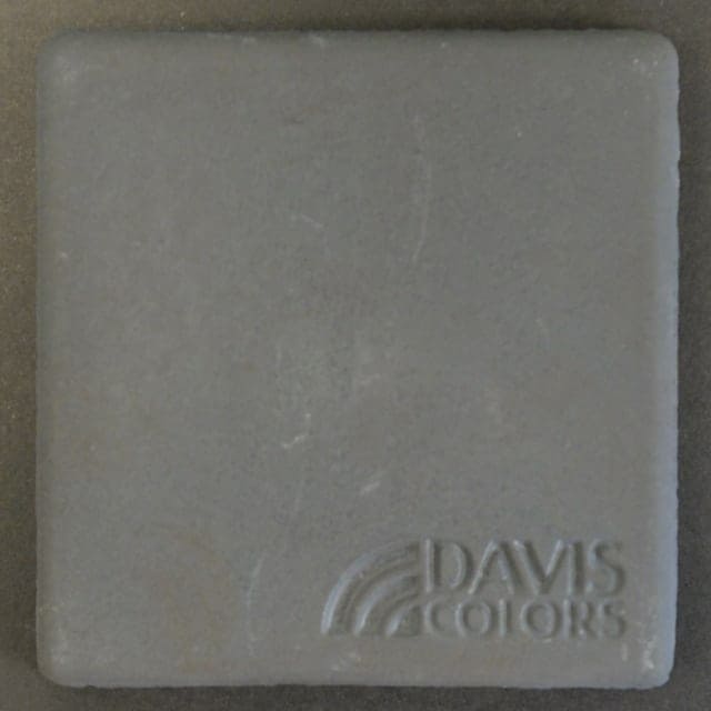 Sample tile colored with Davis Colors Jet Black Carbon concrete pigment