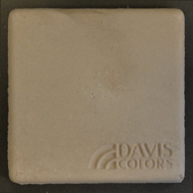 Sample tile colored with Davis Colors Roadside Brown concrete pigment