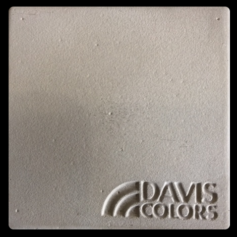 Sample tile colored with Davis Colors Caramel concrete pigment