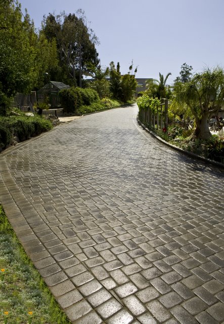 This driveway at the Huntington Beach, CA Winery was paved with Orco Blocks Antique Cobble with Orcos own unique Manor (B3) color blend.  Orco Block uses Davis Colors concrete pigments to create appealing color blends for their concrete pavers.  To learn more about Orcos quality products visit them at www.orcopaverswalls.com/home.htm or call them at 800-473-6725.