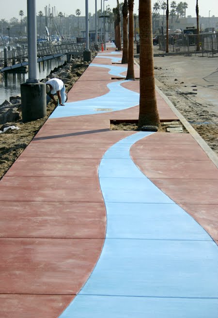 This walkway at the Oceanside, CA marina was integrally colored with Davis Colors' Euroblue and Tile Red.  The concrete has a broom finish.