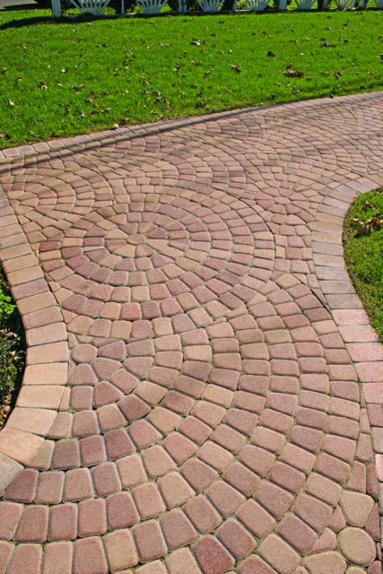 This path is paved with Nicolock’s Sante Euro Circle pavers with their Crab Orchard color blend.  Nicolock uses Davis Colors concrete pigments to make their custom color blends.  To learn more about Nicolock’s products visit them at www.nicolock.com.