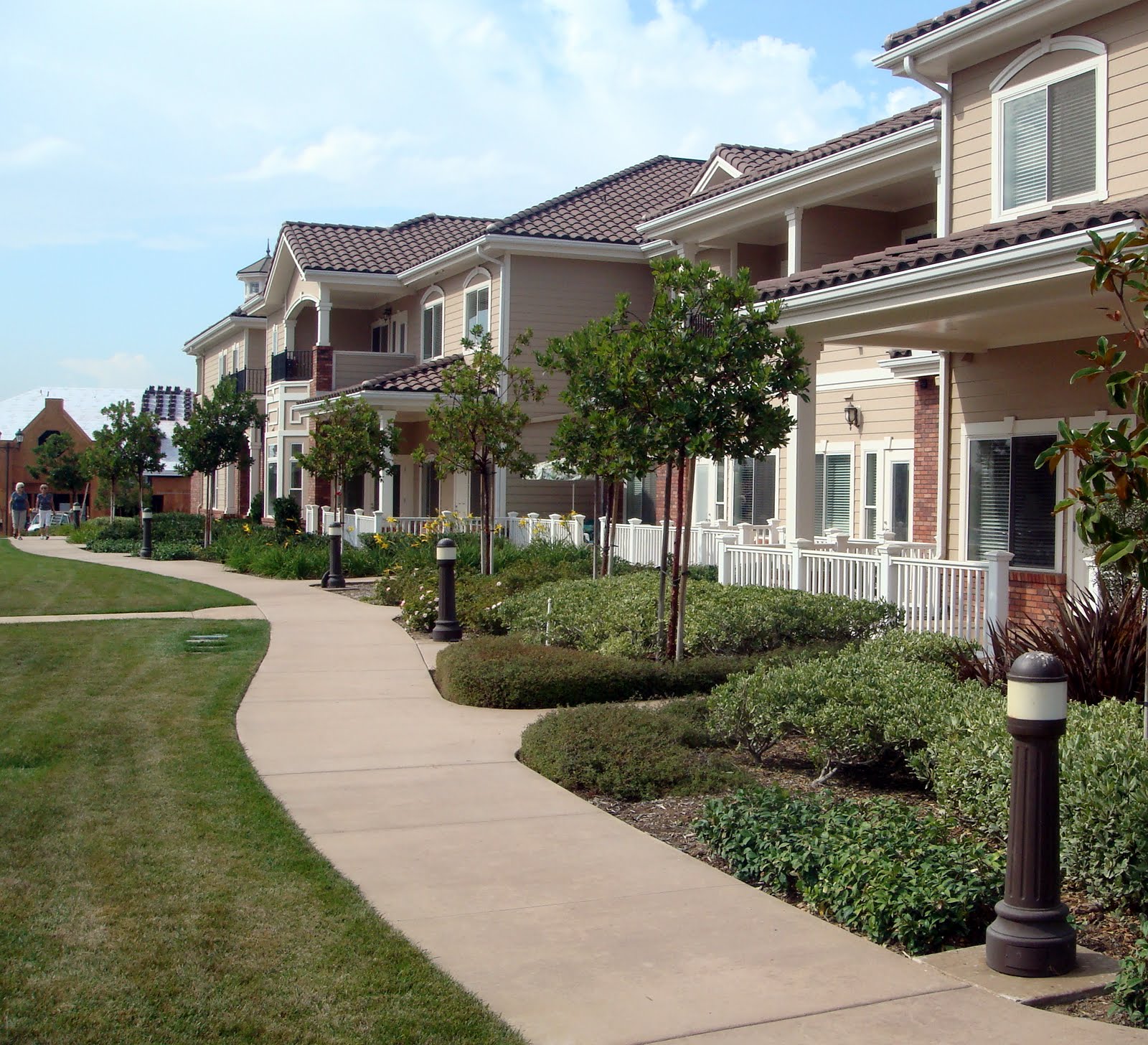 Meadowbrook Village Christian Retirement Community - The color of the sidewalk is Davis Colors' Meadowbrook Brown (custom color). The colored concrete was supplied by Superior Ready Mix (www.superiorrm.com).