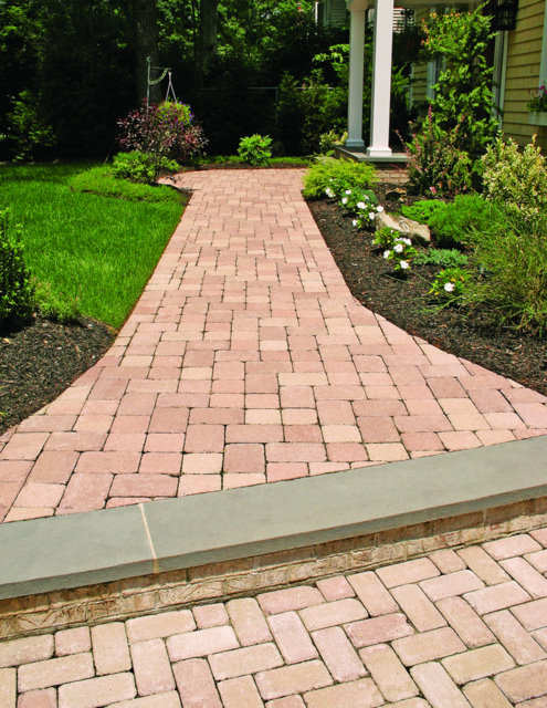 This path is paved with Nicolock’s Country 6” x 6” and 6” x 9” pavers with their Crab Orchard color blend.  Nicolock uses Davis Colors concrete pigments to make their custom color blends.  To learn more about Nicolock’s products visit them at www.nicolock.com.