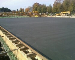 Lincoln Memorial reflecting pool under construction. Davis Colors' "Light Gray" iron oxide black colord concrete. www.daviscolors.com