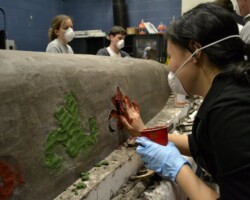 University of Buffalo's concrete canoe team "Monkey Business" wins second place in the 2012 Rigidized Riverfest Regatta. Colored concrete inlays were colored with Davis Colors #160 red and #5376 green. Additional photos can be seen at: http://photos.ubasce.org/index.php/Buffalo-Riverfest-2012.