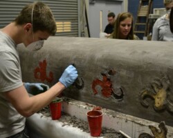 University of Buffalo's concrete canoe team "Monkey Business" wins second place in the 2012 Rigidized Riverfest Regatta. Colored concrete inlays were colored with Davis Colors #160 red and #5376 green. Additional photos can be seen at: http://photos.ubasce.org/index.php/Buffalo-Riverfest-2012.