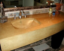 Precast colored concrete bathroom sink and countertop was made by Flying Turtle Cast Concrete (www.flyingturtlecastconcrete.com). Concrete colored with custom colors using Davis Colors’ quality concrete pigments (www.daviscolors.com).