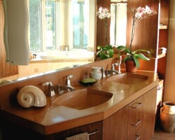 Precast colored concrete bathroom sink and countertop was made by Flying Turtle Cast Concrete (www.flyingturtlecastconcrete.com). Concrete colored with custom colors using Davis Colors’ quality concrete pigments (www.daviscolors.com).