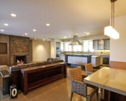 Kitchen, family room, breakfast nook at the Flying Turtle Cast Concrete showcase home (flyingturtlecastconcrete.com). The breakfast nook table is made with custom concrete colors using Davis Colors' concrete pigments (www.daviscolors.com). Photography by Matthew J. Visser • 209.765.0422 • fotomat7@mac.com