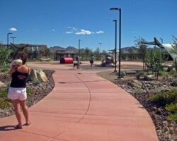 This concrete walkway at the Heritage Bark Park in Henderson, NV was colored with Davis Colors’ Baja Red and finished with a broom finish. The landscape design was done by the Design Workshop. To contact the Design Workshop visit their website www.designworkshop.com or call them at 775-588-5929. To learn more about this project go to http://www.landscapeonline.com/research/article/14721.