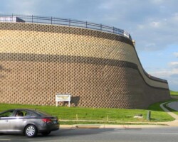 This enormous keystone retaining wall in Abingdon Maryland was built by Griffith Brothers Inc. (410-683-8885) with Keystone Standard units manufactured York Building Products (www.yorkbuilding.com). The colors used were buff, light brown and dark brown.