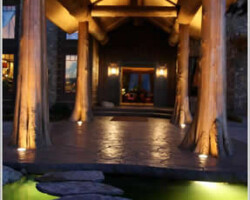 This residential project is located in the Coeur dAlene Idaho area. The concrete contractor Riverstone Stamp Concrete used Davis Colors Bayou integral pigment to color the concrete. They used Arizona Flagstone stamps from Proline Concrete Tools and a medium gray liquid release agent. After washing off the release agent, they returned to use a black grout to hand grout all the stamped joints to make it look like real stone. You can reach Riverstone Stamp Concrete by phone at 208-704-7468. The Ready Mix concrete company was Interstate Concrete & Asphalt their phone number is 208-765-1144. To learn more about this project visit the concretenetwork.com.