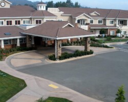 Meadowbrook Village in Escondido, CA selected Davis Colors' Pradre Brown (dark brown) and Meadowbrook Tan (custom color) for their front entrance to their PCU facility. The colored concrete was supplied by Superior Ready Mix (www.superiorrm.com).