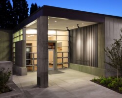 The front entry to the University of Western States (uws.edu) anatomy lab . The cast in place concrete walls were colored with Davis Colors "Green Slate" (daviscolors.com). The architect was Office OA, LLC (ooa-architects.com), the general contractor was Precision Concrete Company (T: 503-253-4827), and the concrete contractor was Whitaker/Ellis (T: 503-768-3017).