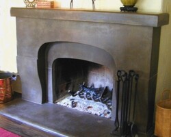 Precast colored concrete fireplace mantle made by Flying Turtle Cast Concrete (www.flyingturtlecastconcrete.com). Concrete colored with custom colors using Davis Colors’ concrete pigments (www.daviscolors.com).