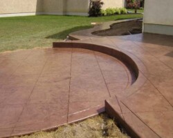 This patio was colored with Davis Colors’ Rustic Brown and stamped with a Slate Stone texture. The release agent color was Desert Tan. The concrete was then diagonally cut into 2’ by 2” sections. The concrete work was done by Butch Bando Concrete, Inc. located in Galena, Ohio. You can reach Butch Bando Concrete, Inc. by visiting their website at www.butchbandoconcrete.com or by calling them at 740-548-7322. These photos were provide by Butch Bando Concrete, Inc. and are being used with their permission. To learn more about Davis Colors concrete colors go to www.daviscolors.com. This patio was colored with Davis Colors’ Rustic Brown and stamped with a Slate Stone texture. The release agent color was Desert Tan.