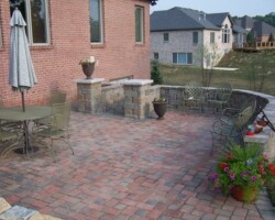 Concrete Block: Wilson Concrete products Country Manor with a Cedar color blend. The concrete pavers are Wilson Concrete Products Cobblesone Pavers with their custom New England color blend. Wilson Concrete products Country Manor with a Cedar color blend. The concrete pavers are Wilson Concrete Products Cobblesone Pavers with their custom New England color blend.