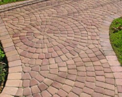 This path is paved with Nicolock’s Sante Euro Circle pavers with their Crab Orchard color blend. Nicolock uses Davis Colors concrete pigments to make their custom color blends. To learn more about Nicolock’s products visit them at www.nicolock.com.