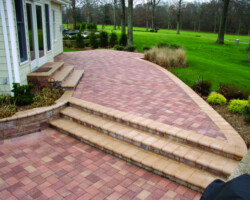 This patio is paved with Nicolock’s Rustico 6” x 9” pavers with their Crab Orchard color blend. Nicolock uses Davis Colors concrete pigments to make their custom color blends. To learn more about Nicolock’s products visit them at www.nicolock.com.